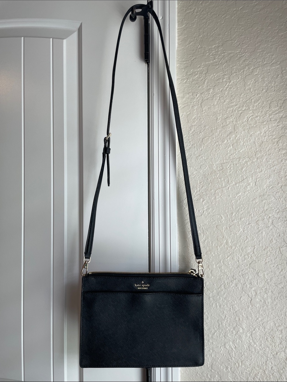 kate spade black crossbody with gold hardware